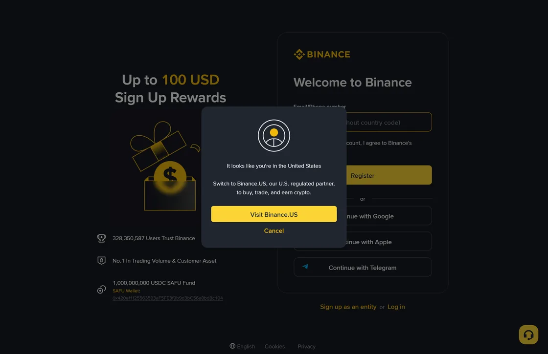 The Binance signup page in a browser, with a dialog over it reading that it looks like you are in the United States and offering a button to visit Binance.US instead